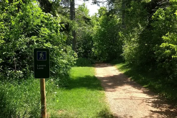 This is a sign for "Lovers Lane” at Anne of Green Gables Heritage Place.
